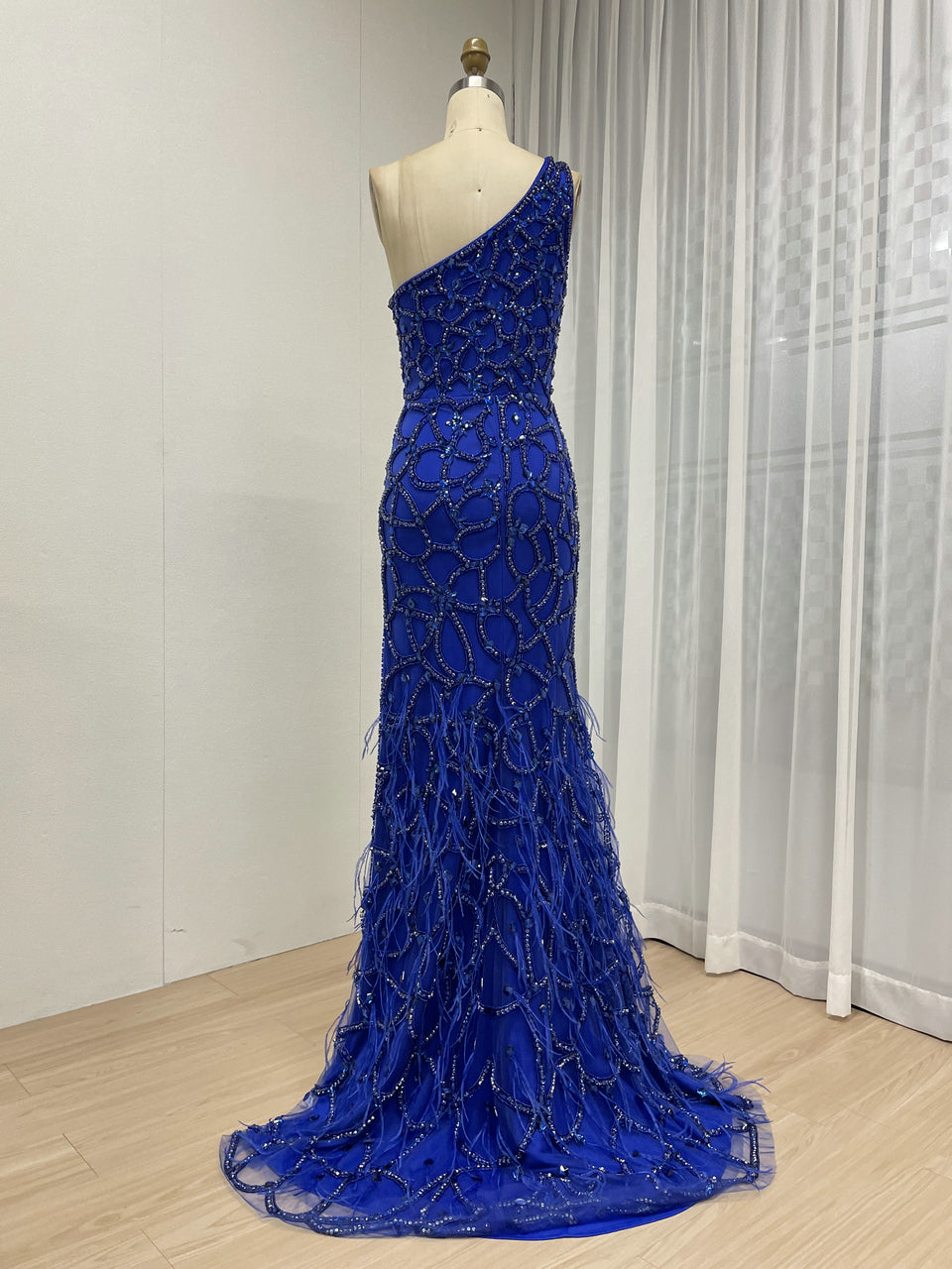 Royal Blue Beaded Evening Gown with Feather Slit & Lattice Detail MC20080
