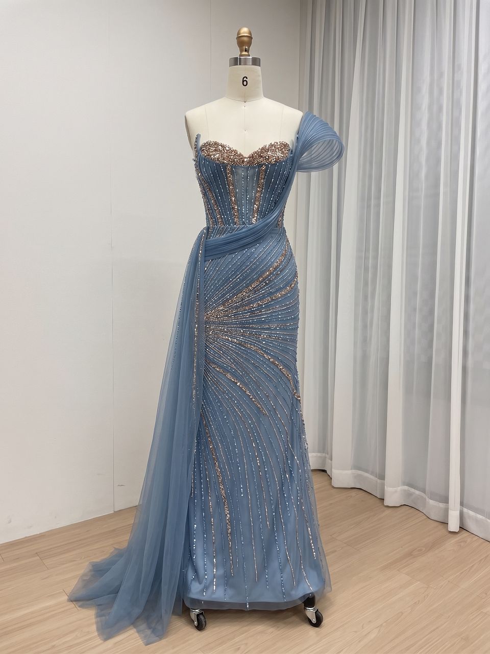 Champagne Couture Formal Gown with Beaded Corset Bodice and Flowing Train MC20180