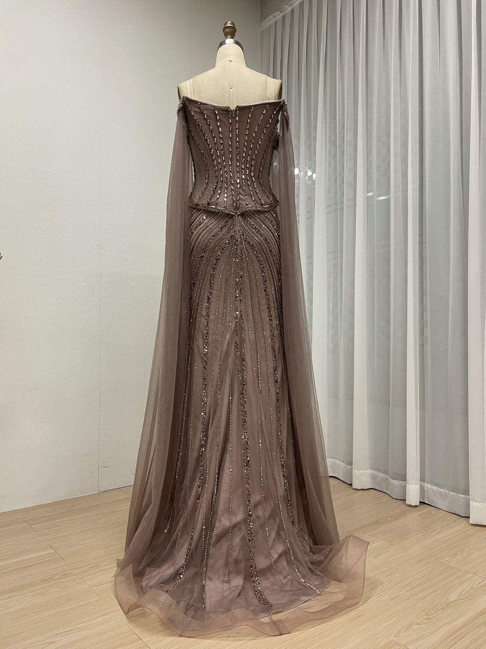 Black Beaded Evening Gown with Sheer Draped Cape Sleeves and Corset Bodice MC20187