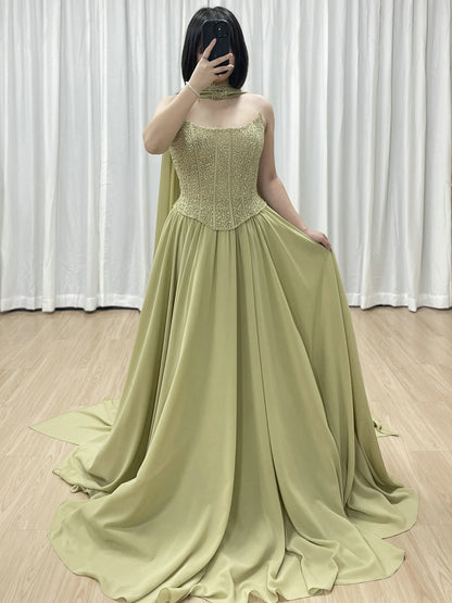 Elegant Flowing Green Formal Dress with Intricate Gold Beading MB40438