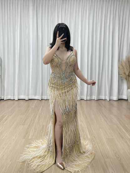 Luxe Champagne Beaded Evening Gown with Feather Hem & High Slit MC20127
