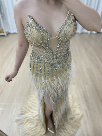 Luxe Champagne Beaded Evening Gown with Feather Hem & High Slit MC20127