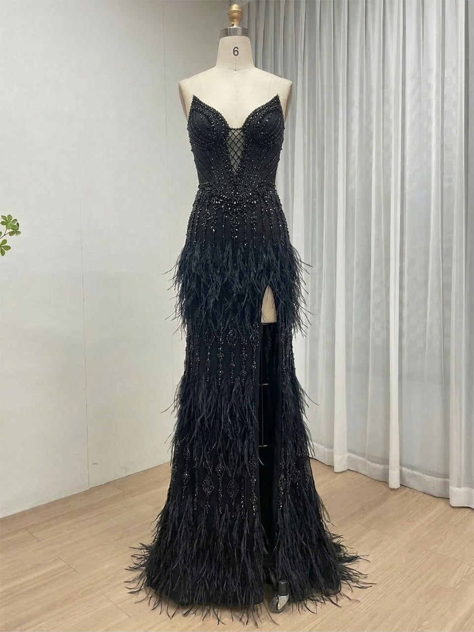 Luxe Champagne Beaded Evening Gown with Feather Hem & High Slit MC20127