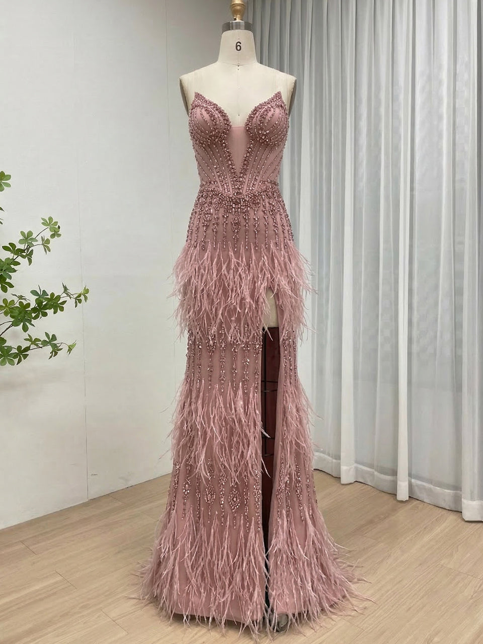 Luxe Champagne Beaded Evening Gown with Feather Hem & High Slit MC20127