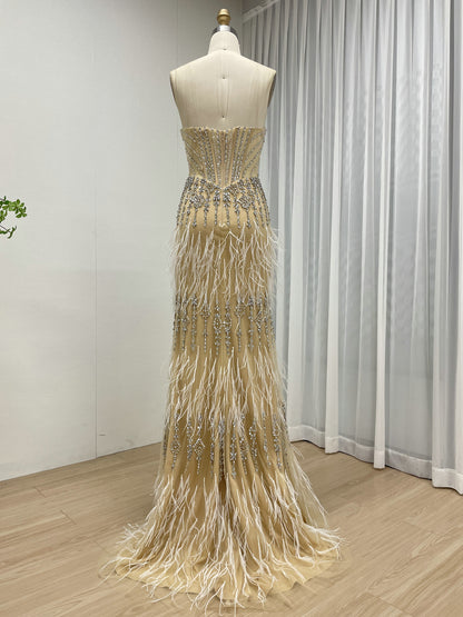 Luxe Champagne Beaded Evening Gown with Feather Hem & High Slit MC20127