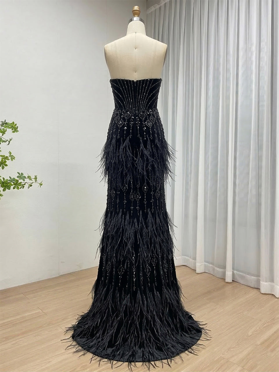 Luxe Champagne Beaded Evening Gown with Feather Hem & High Slit MC20127