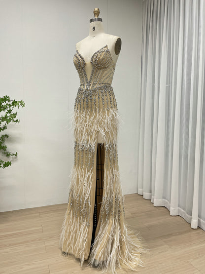 Luxe Champagne Beaded Evening Gown with Feather Hem & High Slit MC20127