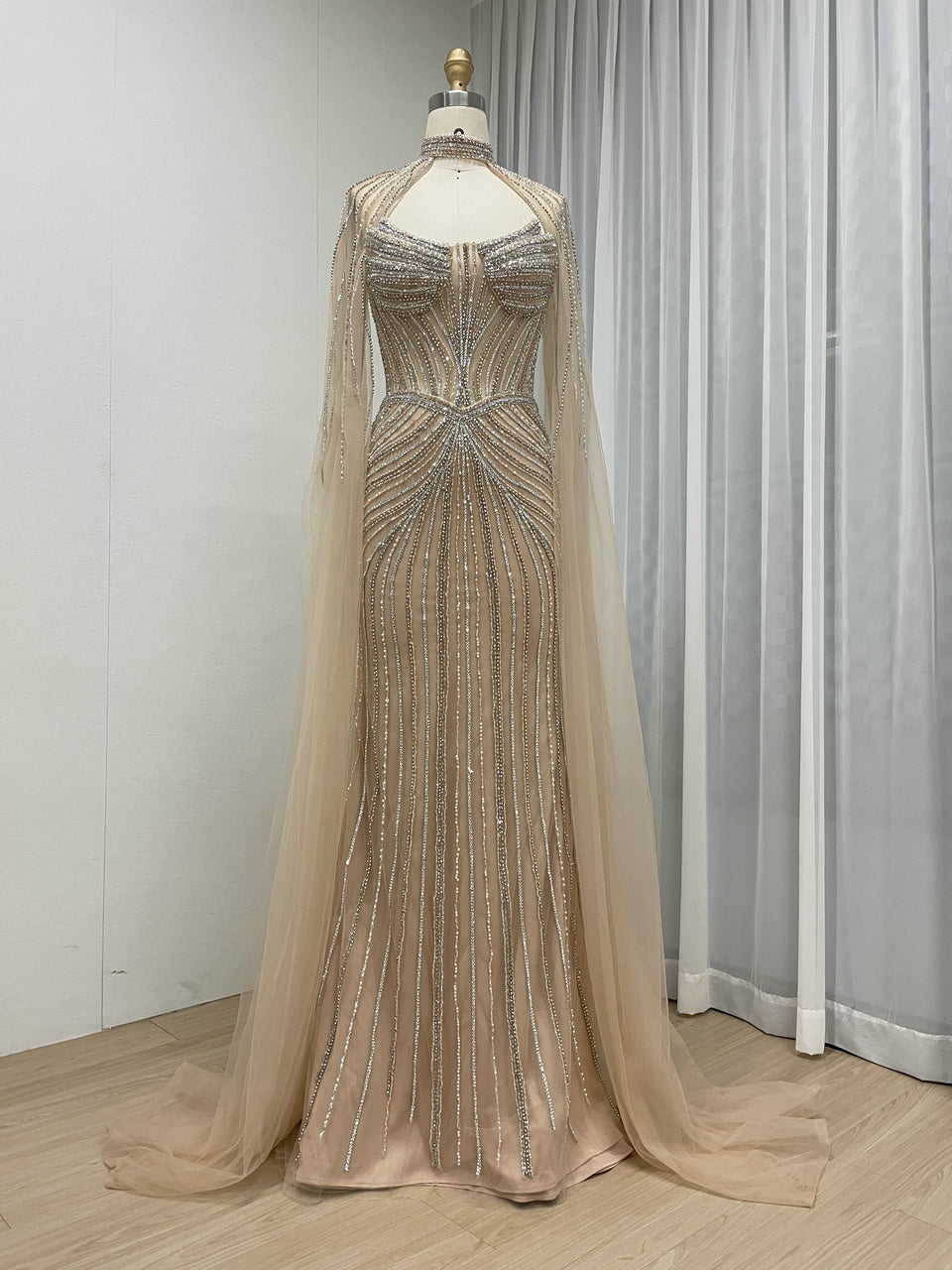 Luxury Champagne Beaded Evening Gown with Halter Neck & Attached Capes MC20159