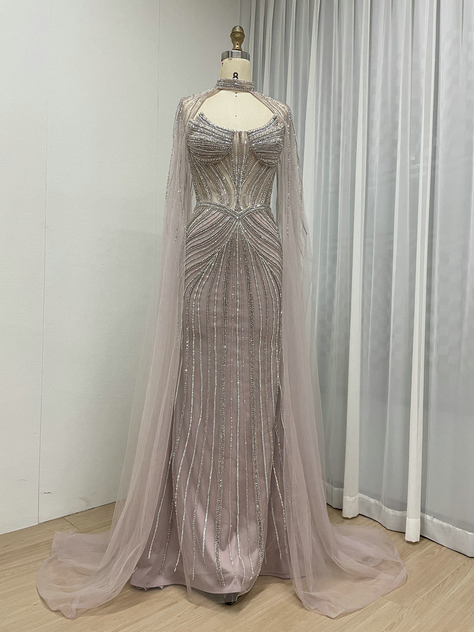 Luxury Champagne Beaded Evening Gown with Halter Neck & Attached Capes MC20159