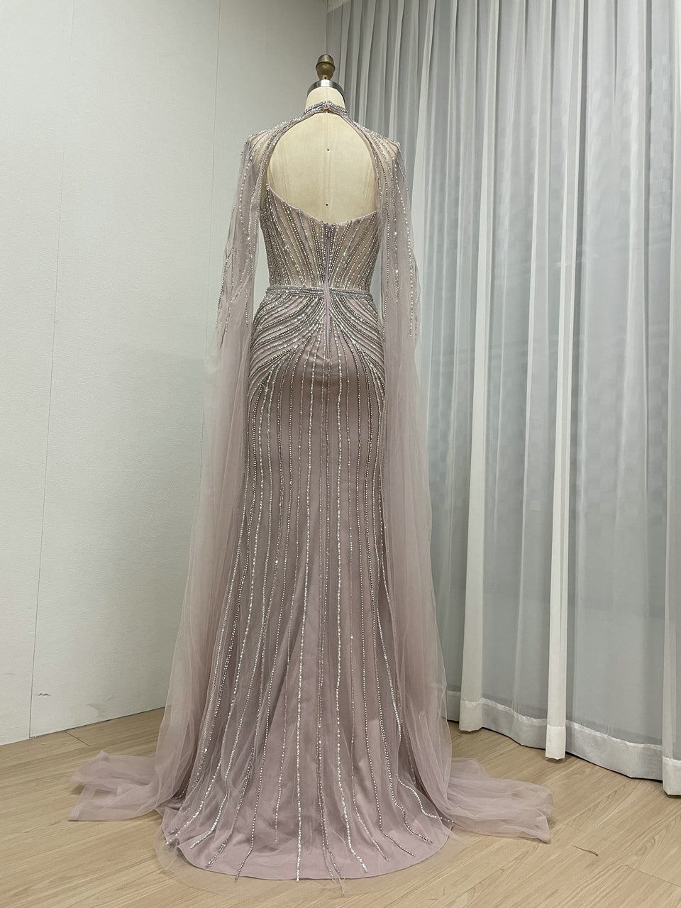 Luxury Champagne Beaded Evening Gown with Halter Neck & Attached Capes MC20159