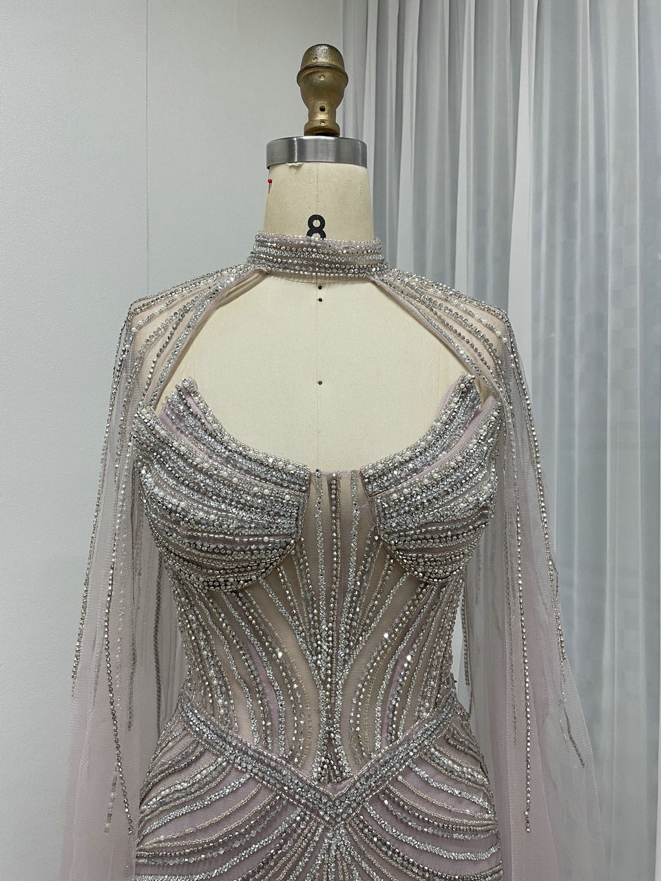 Luxury Champagne Beaded Evening Gown with Halter Neck & Attached Capes MC20159