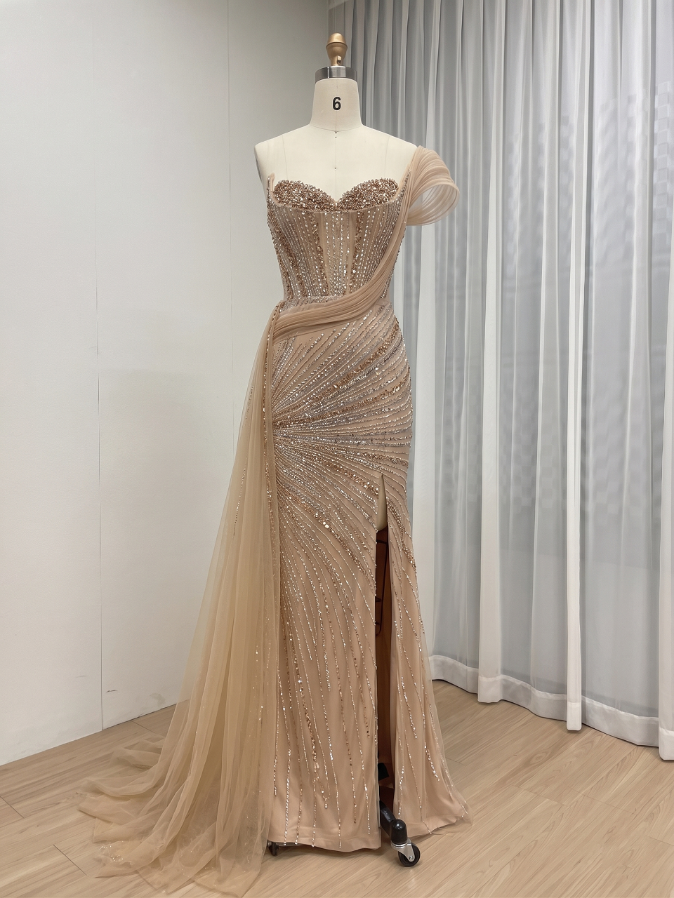 Champagne Couture Formal Gown with Beaded Corset Bodice and Flowing Train MC20180