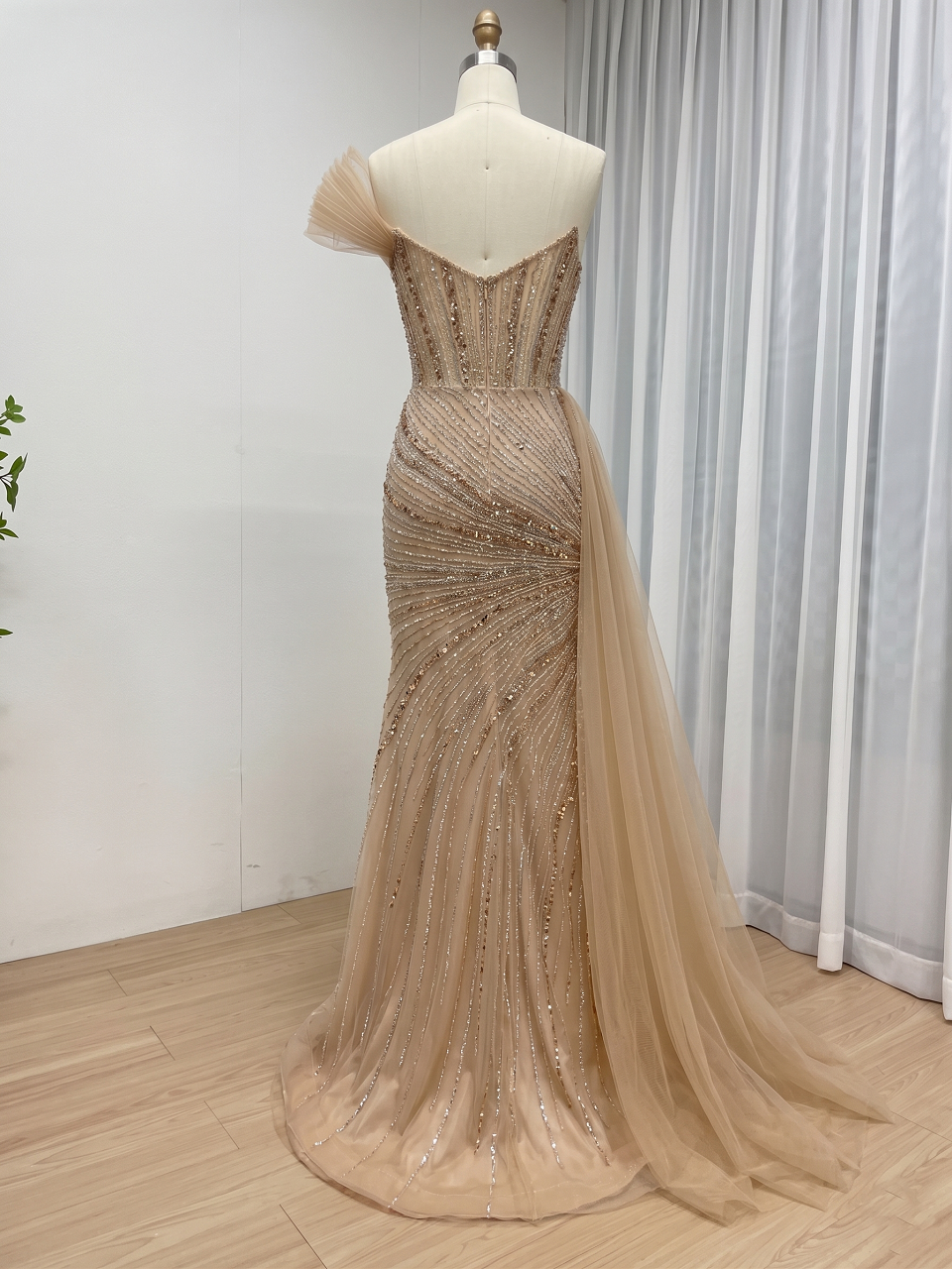 Champagne Couture Formal Gown with Beaded Corset Bodice and Flowing Train MC20180