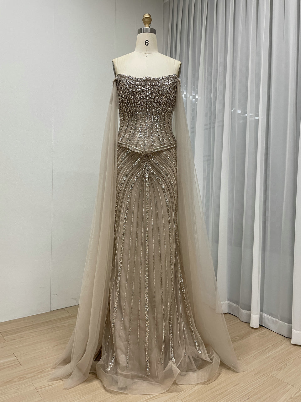 Black Beaded Evening Gown with Sheer Draped Cape Sleeves and Corset Bodice MC20187