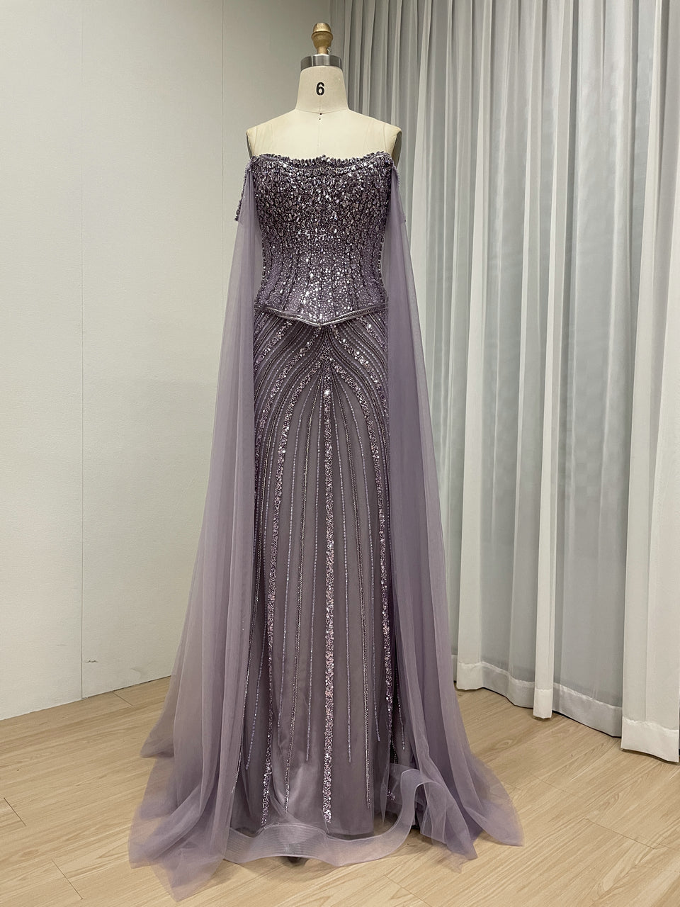 Black Beaded Evening Gown with Sheer Draped Cape Sleeves and Corset Bodice MC20187