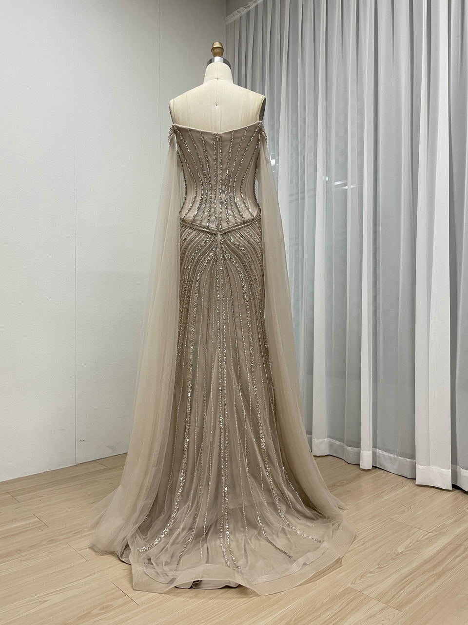 Black Beaded Evening Gown with Sheer Draped Cape Sleeves and Corset Bodice MC20187