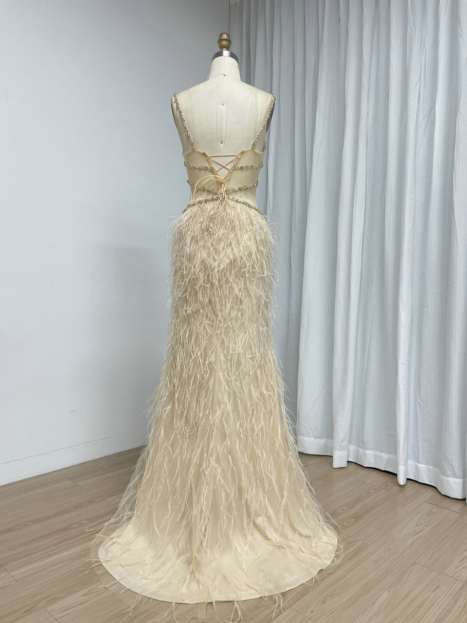 Blush Pink Feather Evening Gown with Crystal Embellished Bodice and High Slit MC20209
