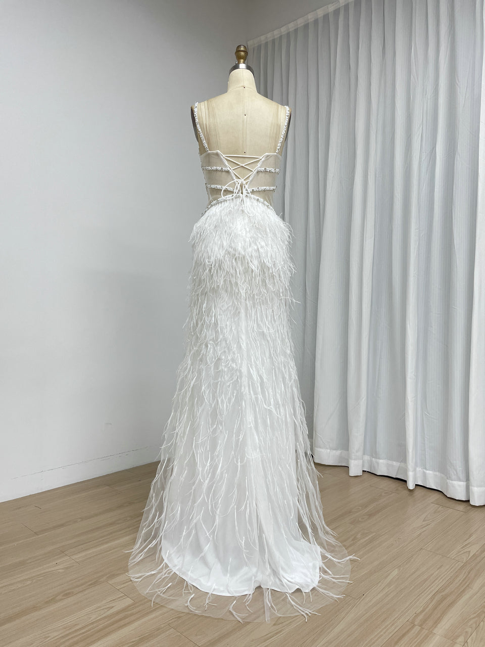 Blush Pink Feather Evening Gown with Crystal Embellished Bodice and High Slit MC20209
